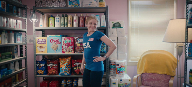 Seventh Generation, Suave, Caress, Dove, General Mills Golden Grahams, Rice Chex, Trix, Cocoa Puffs, Doritos and Cheetos of Kristen Bell as Connie in Queenpins (2021)