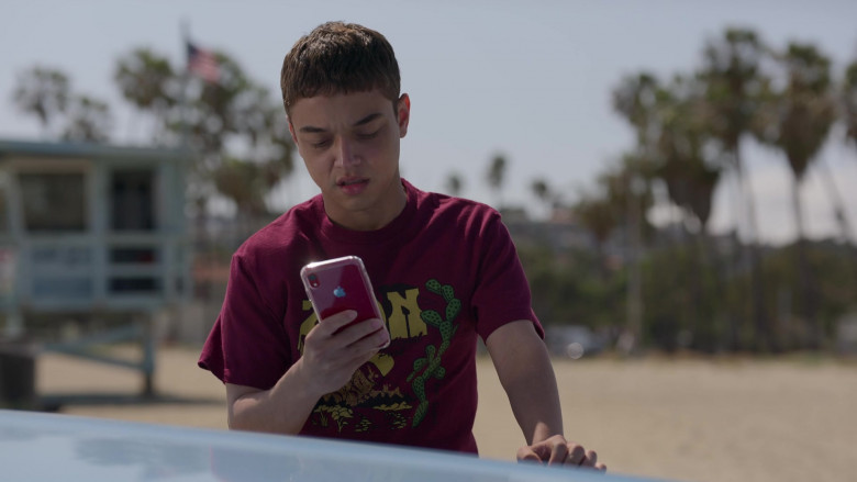 Apple iPhone Red Smartphone Held by Jason Genao as Ruby Martinez in On My Block S04E08 Chapter Thirty-Six (2021)