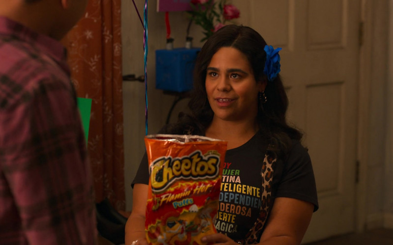 CHEETOS Puffs FLAMIN’ HOT Cheese Flavored Snacks Held by Jessica Marie Garcia as Jasmine in On My Block S04E09 Chapte