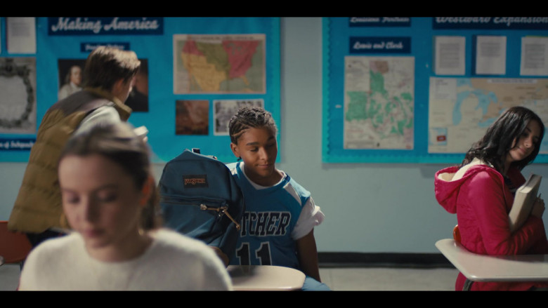 JanSport Blue Backpack of Jaden Michael plays Colin Kaepernick (teenage) in Colin in Black & White S01E01 Cornrows (2021