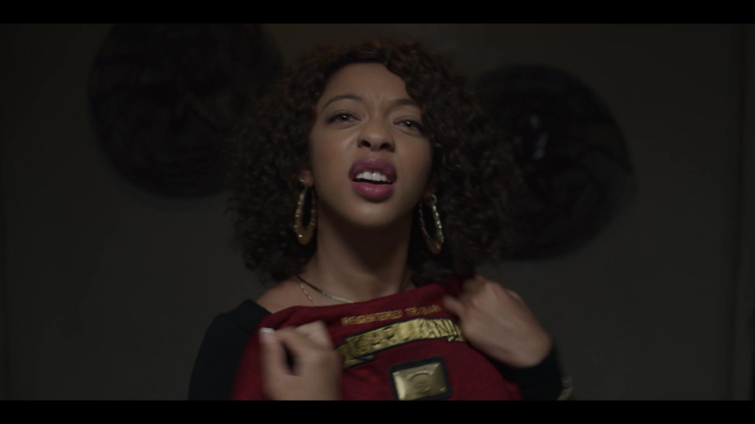 Karl Kani Red Top Held By Zolee Griggs As Shurrie Diggs In WuTang An