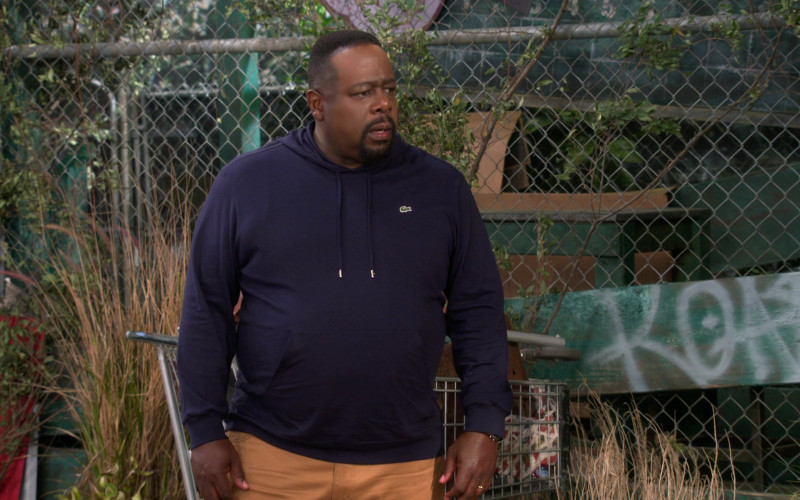 Lacoste Blue Hoodie of Cedric the Entertainer as Calvin Butler in The Neighborhood S04E03 Welcome to the Sister From Another Mister (2021