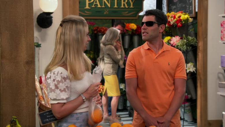 Ralph Lauren Orange Polo Shirt of Max Greenfield as Dave Johnson in The Neighborhood S04E05 Welcome to Your Match (2021)