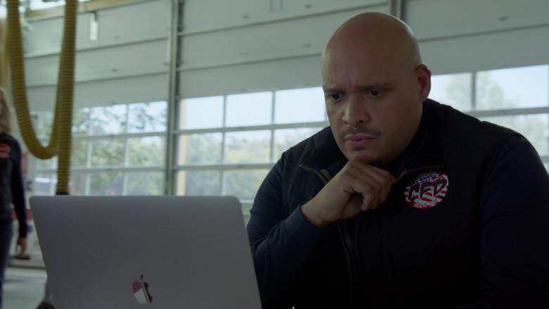 Apple MacBook Laptop of Joe Minoso as Firefighter Joe Cruz in Chicago Fire S10E08 What Happened at Whiskey Point (2021)