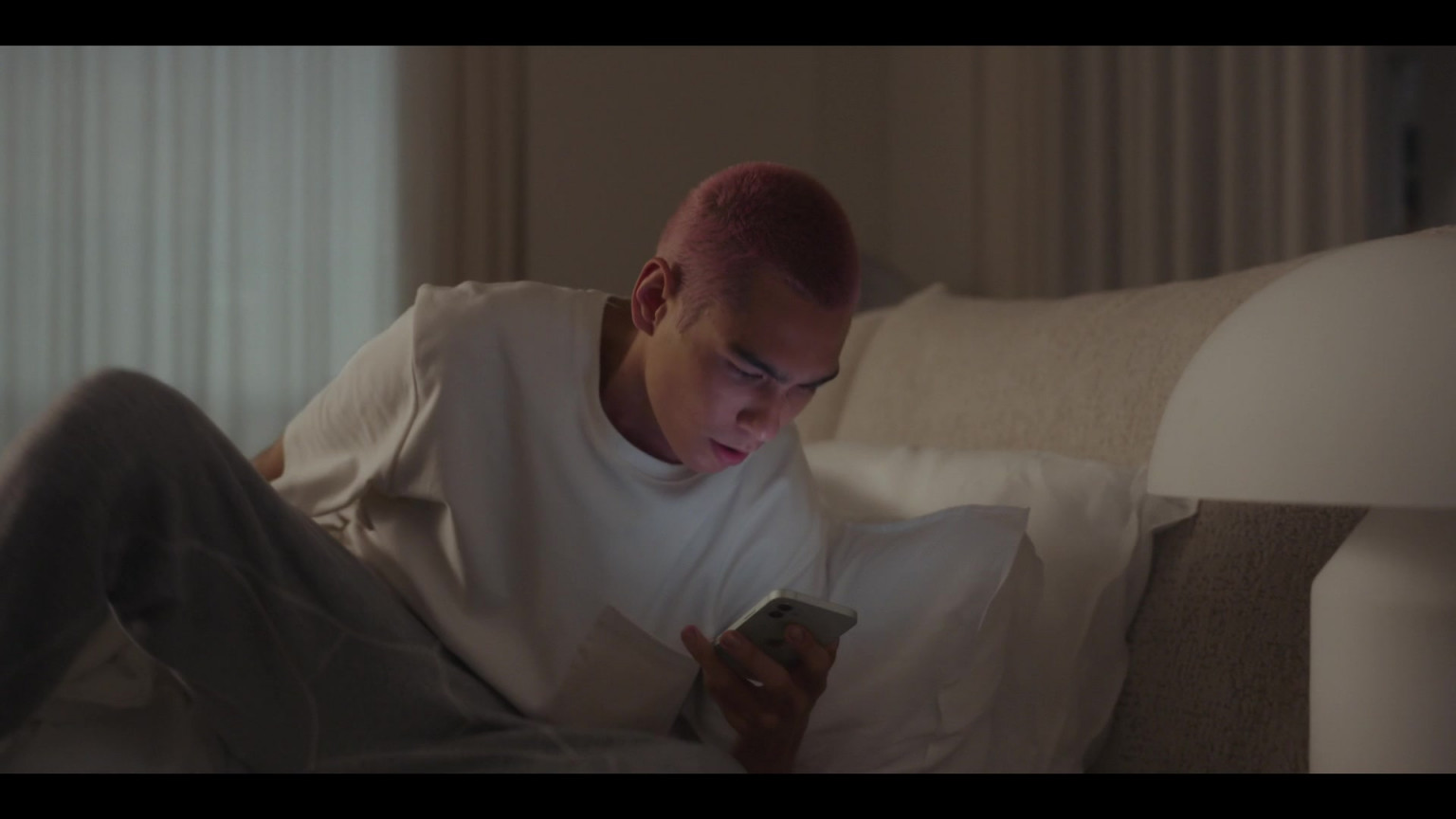 Apple IPhone Smartphone Held By Evan Mock As Akeno 'Aki' Menzies In