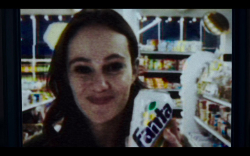 Fanta Soda Can Held by Dina Shihabi as Melody Pendras in Archive 81 S01E03 Terror in the Aisles (2022)