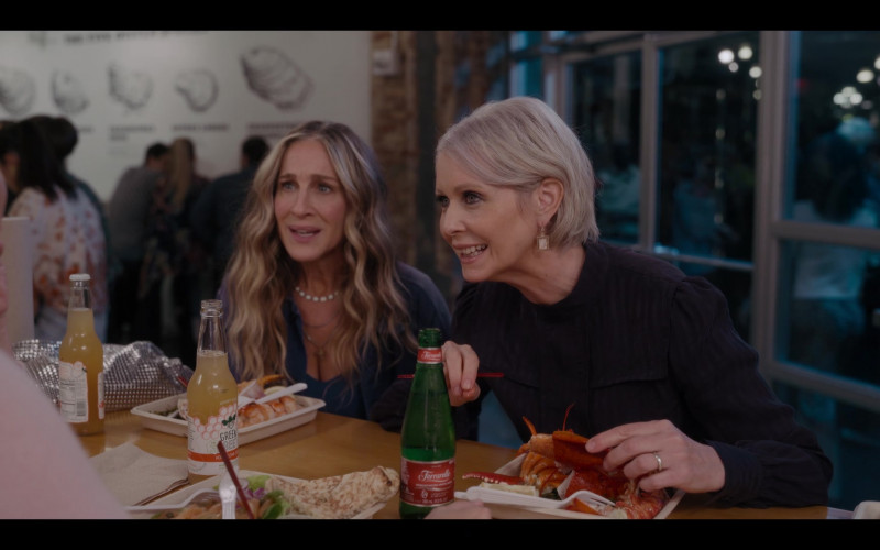Green Bee Honeycomb Cider of Sarah Jessica Parker as Carrie Bradshaw and Ferrarelle Water of Cynthia Nixon as Miranda Hobbs in And Just Like That… S01E08