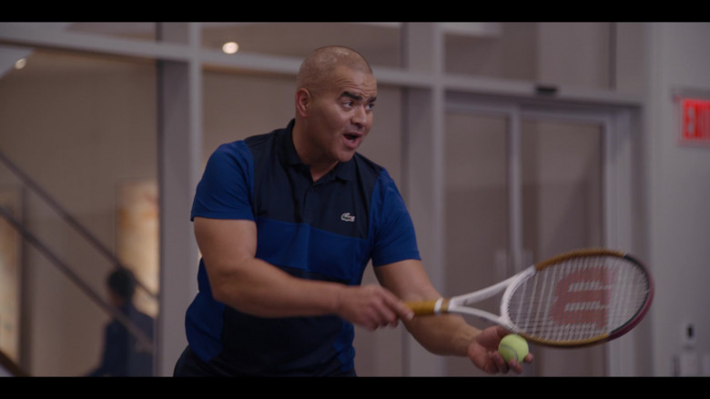 Lacoste Men's Polo Shirt and Wilson Tennis Racquet in And Just Like That… S01E07 Sex and the Widow (2022)
