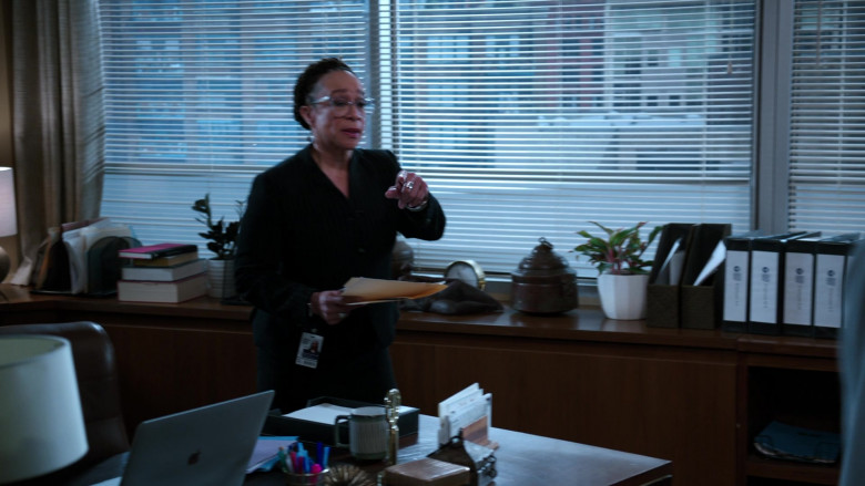 Apple MacBook Laptop of S. Epatha Merkerson as Sharon Goodwin in Chicago Med S07E13 Reality Leaves a Lot to the Imagination (2022)