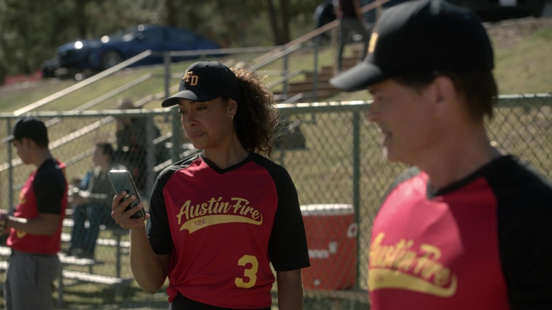 Apple iPhone Smartphone Held (Upside Down) by Gina Torres as Tommy Vega in 9-1-1 Lone Star S03E07 Red vs. Blue (2022)