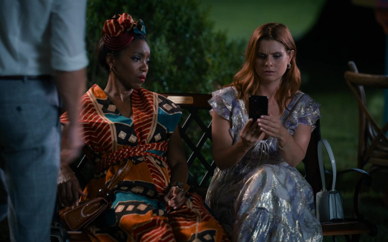 Apple iPhone Smartphone Held by JoAnna Garcia Swisher as Maddie Townsend in Sweet Magnolias S02E10 If Thou Wilt, Remember (2022)