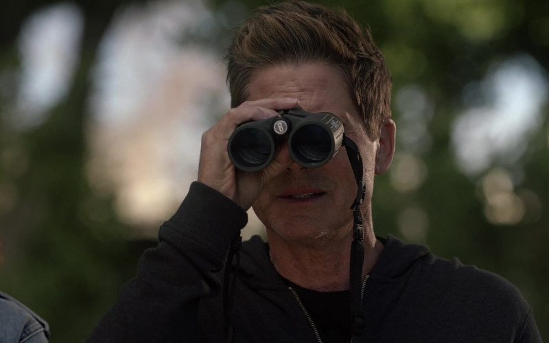 Bushnell Binocular of Rob Lowe as Owen Strand in 9-1-1: Lone Star S03E07 "Red vs. Blue" (2022)