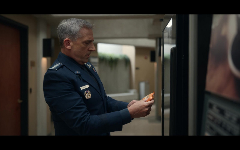 SunChips Harvest Cheddar Flavored Multigrain Snacks of Steve Carell as General Mark R. Naird in Space Force S02E05 Mad (Buff) Confidence (2022)