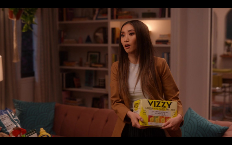 Vizzy Lemonade Hard Seltzer Held by Brenda Song as Madison Maxwell in Dollface S02E05 Miss Codependent (2022)