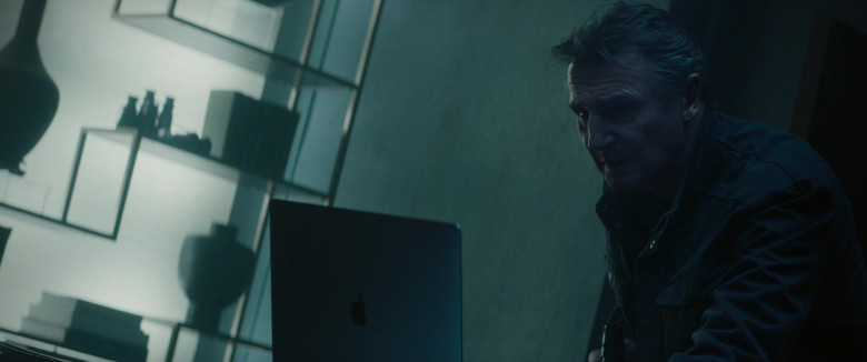 Apple MacBook Laptop Computer Used by Liam Neeson as Travis Block in Blacklight (2022)