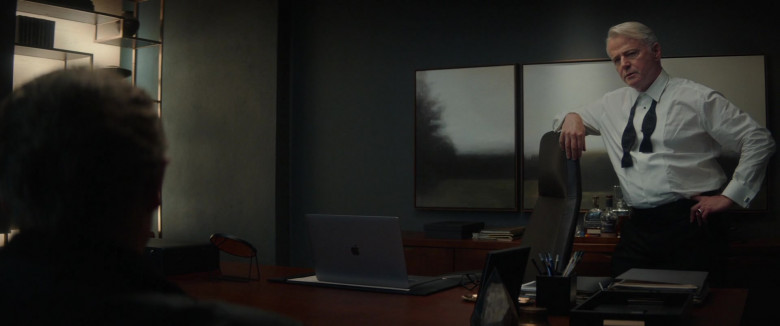 Apple MacBook Laptop of Aidan Quinn as Gabriel Robinson in Blacklight (2022)