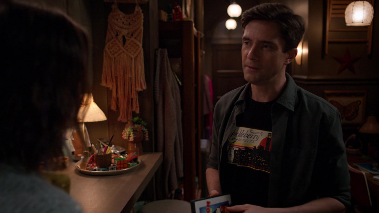 Huckleberry Bicycles T-Shirt of Topher Grace as Tom in Home Economics S02E17 Workout Leggings, $29 (2022)
