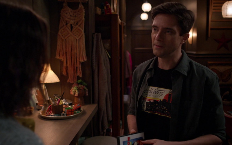 Huckleberry Bicycles T-Shirt of Topher Grace as Tom in Home Economics S02E17 Workout Leggings, $29 (2022)