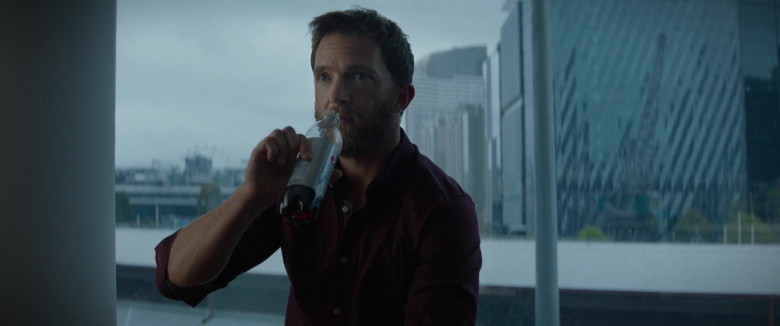 Pepsi Soda Enjoyed by Tim Draxl as Drew Hawthorne in Blacklight (2022)