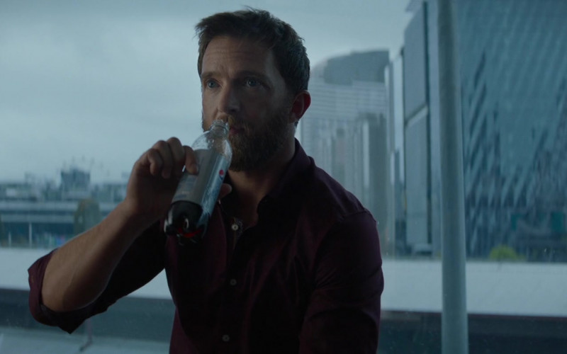 Pepsi Soda Enjoyed by Tim Draxl as Drew Hawthorne in Blacklight (2022)