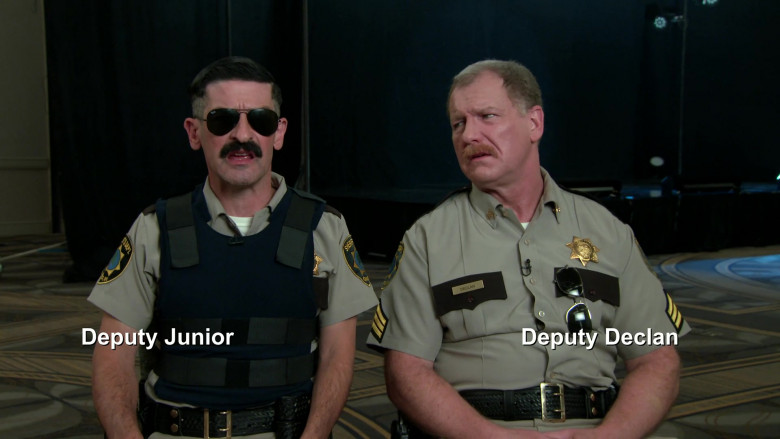Ray-Ban Aviator Sunglasses of Robert Ben Garant as Deputy Travis Junior in Reno 911! S08E07 Jonesteenth (2022)