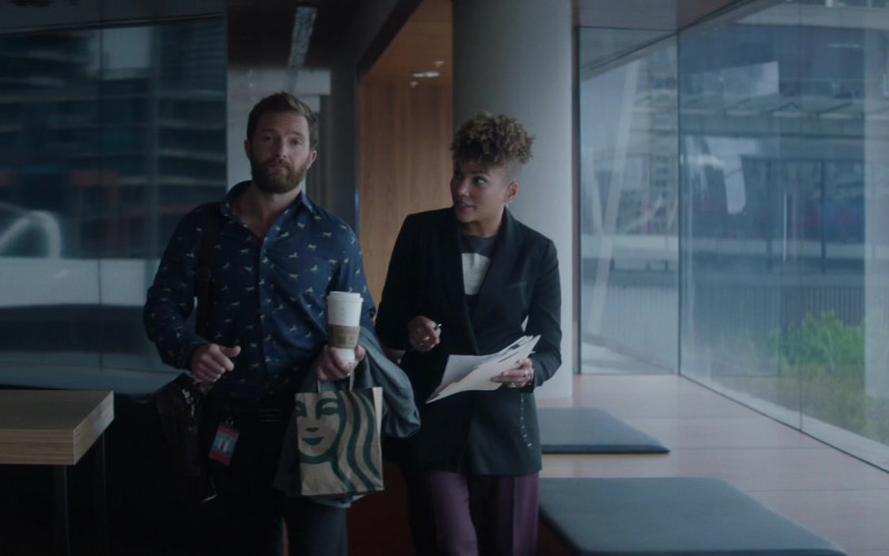 Starbucks Coffeehouse Paper Bag Held by Tim Draxl as Drew Hawthorne in Blacklight (2022)