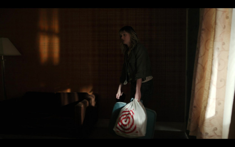 Target Store Plastic Bag of Bella Heathcote as Andy Oliver in Pieces of Her S01E02 (2022)