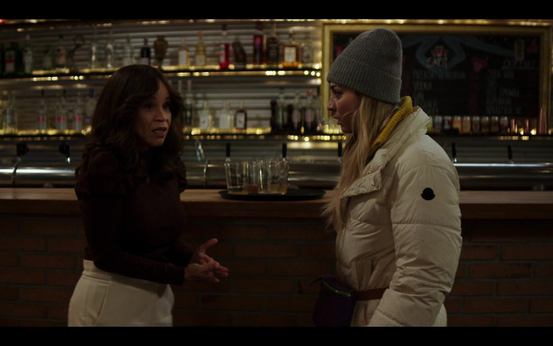 Moncler Women’s White Long Down Jacket of Kaley Cuoco as Cassie Bowden in The Flight Attendant S02E04 Blue Sincerely Reunion