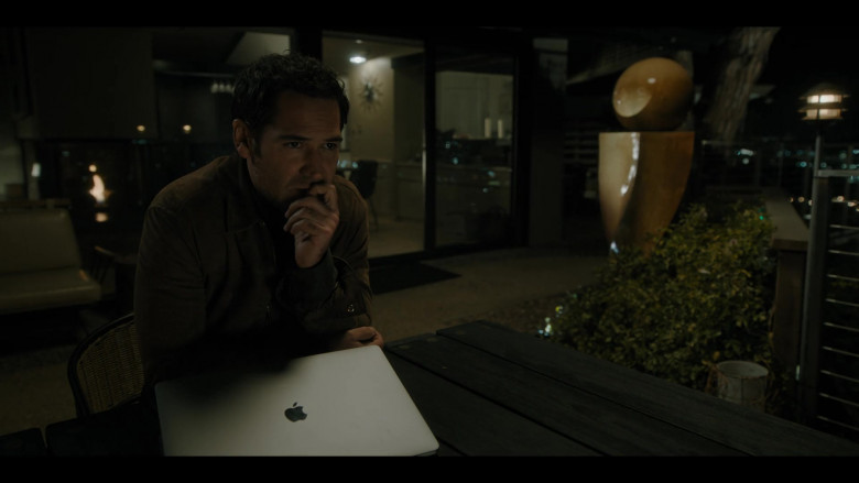 Apple MacBook Laptop Computer Used by Manuel Garcia-Rulfo as Mickey Haller in The Lincoln Lawyer S01E07 Lemming Number Seven (2022)