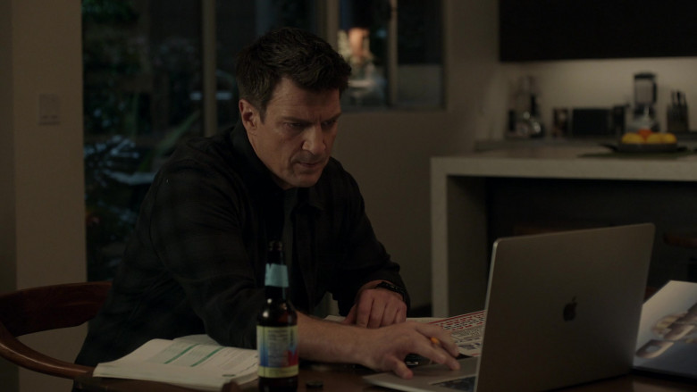 Apple MacBook Laptop Computer Used by Nathan Fillion as John Nolan in The Rookie S04E21 Mother's Day (2022)