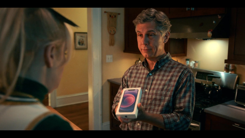 Apple iPhone Smartphone Held by Chris Parnell as Jim Conway in Senior Year (2022)