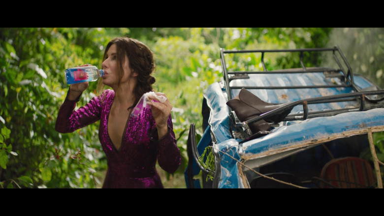 Fiji Bottled Water Enjoyed by Sandra Bullock as Loretta Sage in The Lost City (2022)