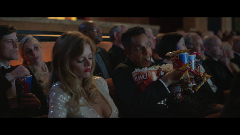 Kit Kat Chocolate Bars and M&M's Candies Held by Eugenio Derbez as Antonio in The Valet (2022)