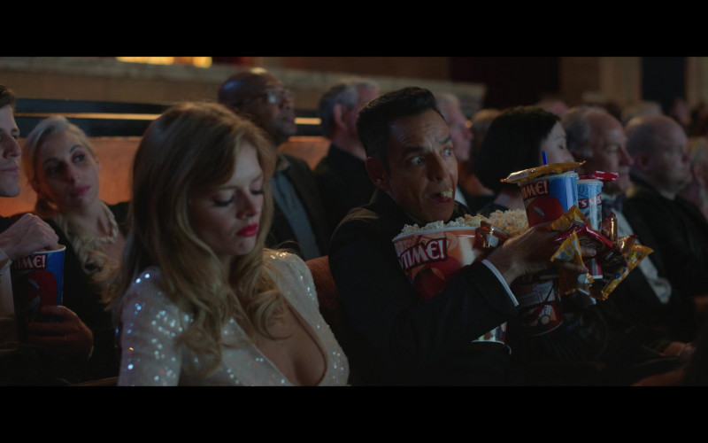 Kit Kat Chocolate Bars and M&M’s Candies Held by Eugenio Derbez as Antonio in The Valet (2022)