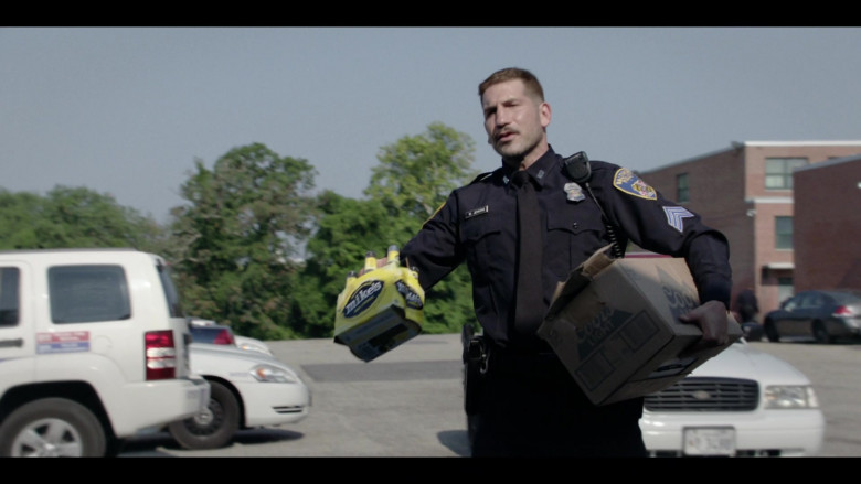 Mike's Hard Lemonade and Coors Light Beer Box Held by Jon Bernthal as Wayne Jenkins in We Own This City S01E04 Part Four (2022)