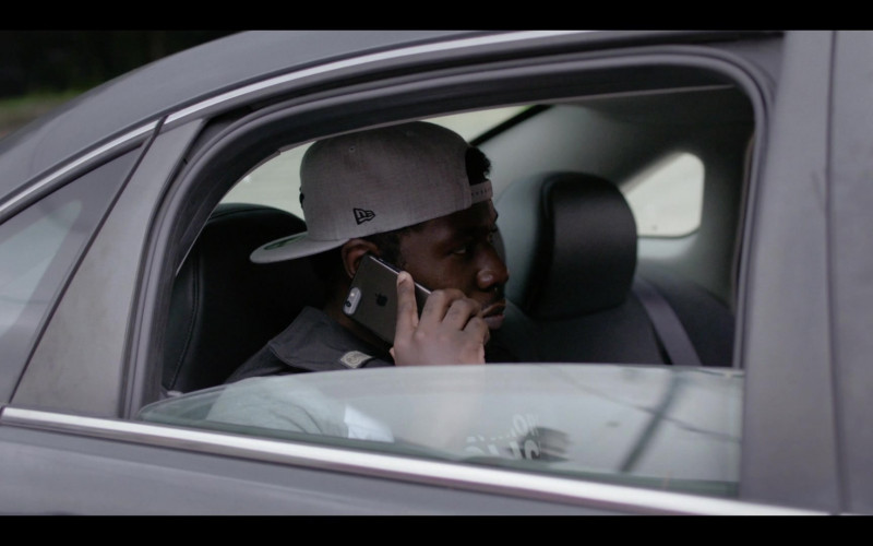 New Era Cap and Apple iPhone Smartphone in We Own This City S01E03 Part Three (2022)