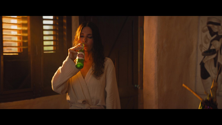 Stella Artois Beer Enjoyed by Sandra Bullock as Loretta Sage in The Lost City 2022 Movie (3)