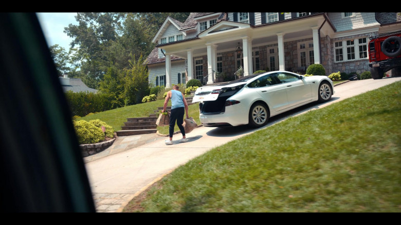 Tesla Model S White Car of Justin Hartley as Blaine Balboa in Senior Year Movie (1)