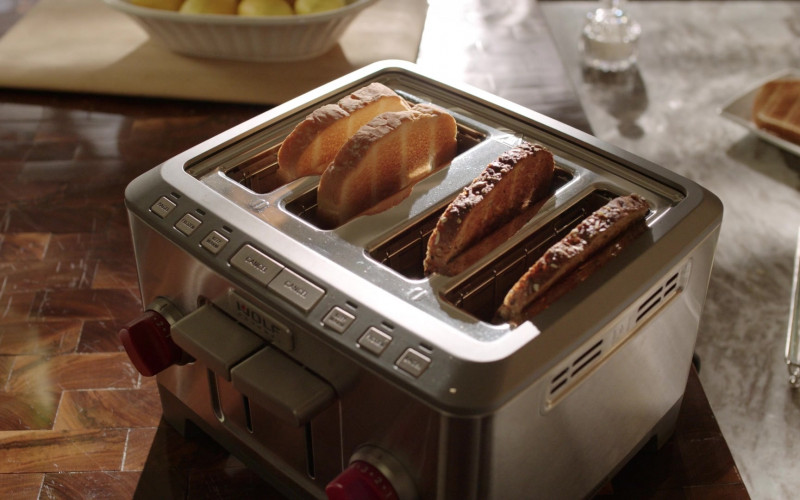 Wolf Gourmet 4-Slice Extra-Wide Slot Toaster with Shade Selector, Bagel and Defrost Settings, Red Knob, Stainless Steel in Dynasty S05E11 "I'll Settle for a Prayer" (2022)