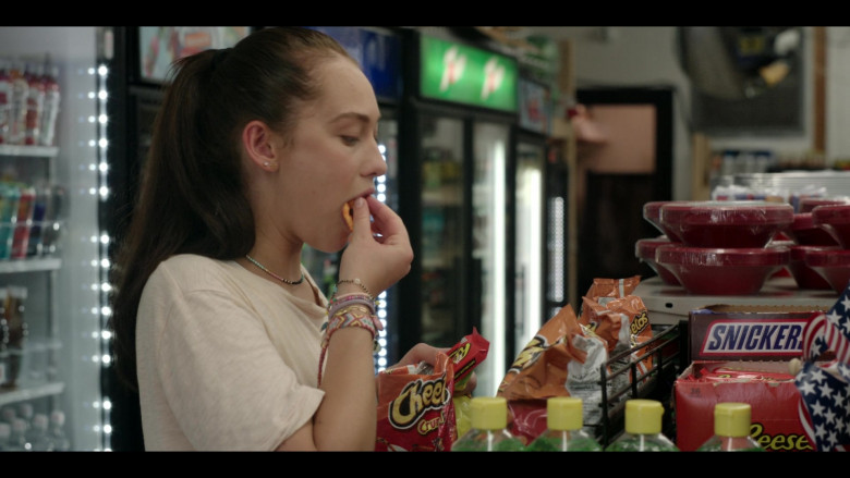 CHEETOS Crunchy Cheese Flavored Snacks, Snickers Chocolate Bars and Reese's in The Summer I Turned Pretty S01E01 Summer House (2022)