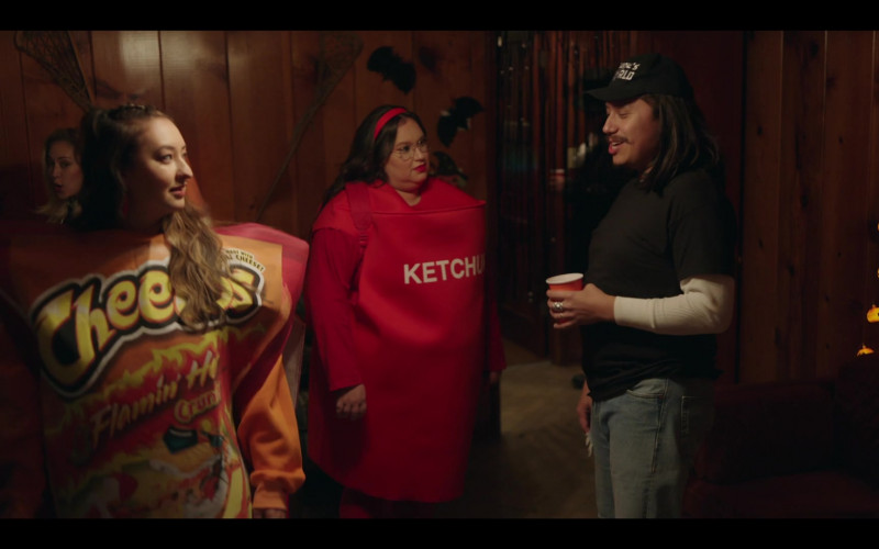 Cheetos Costume in Rutherford Falls S02E06 "Firefighters Pancake Breakfast" (2022)