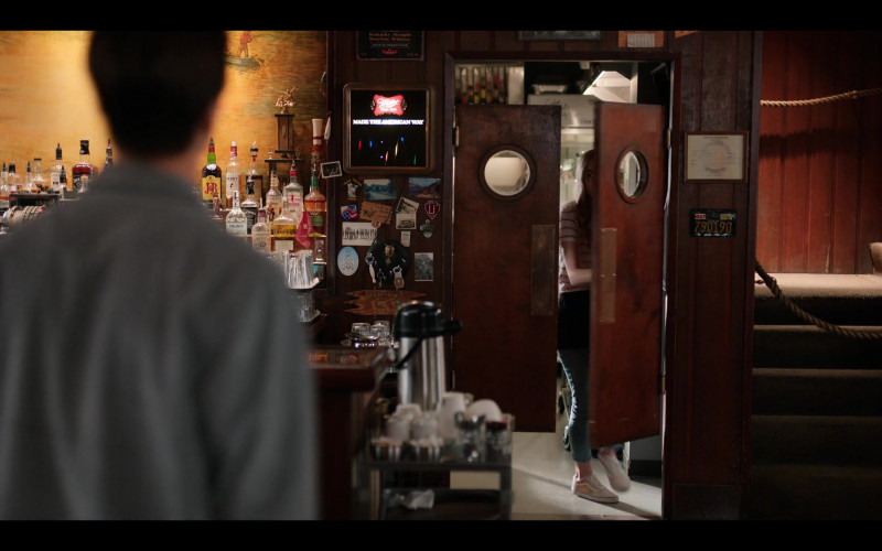 Absolut Vodka, J.P. Wiser's Whisky, J&B Scotch Whisky, Paddy Whiskey, Finlandia Vodka, Captain Morgan Rum, Canadian Club, Miller High Life Sign in Virgin River S04E07 "Otherwise Engaged" (2022)