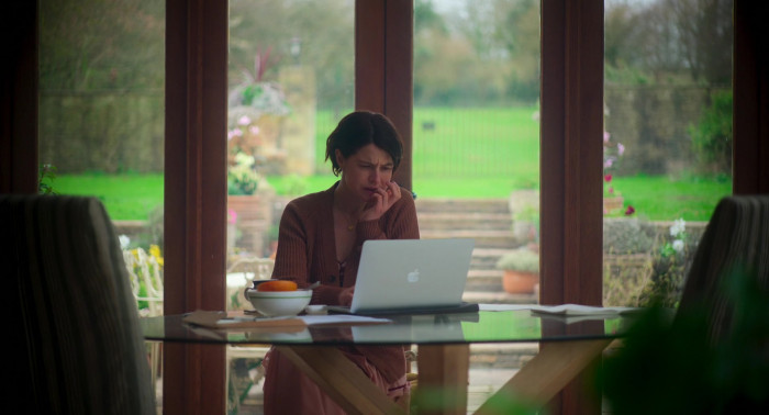 Apple MacBook Laptop of Jessie Buckley as Harper in Men (2022)