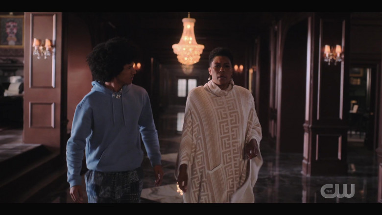 Balmain Monogram Pattern Roll-Neck Poncho in Tom Swift S01E07 … And the Book of Isaac (2022)