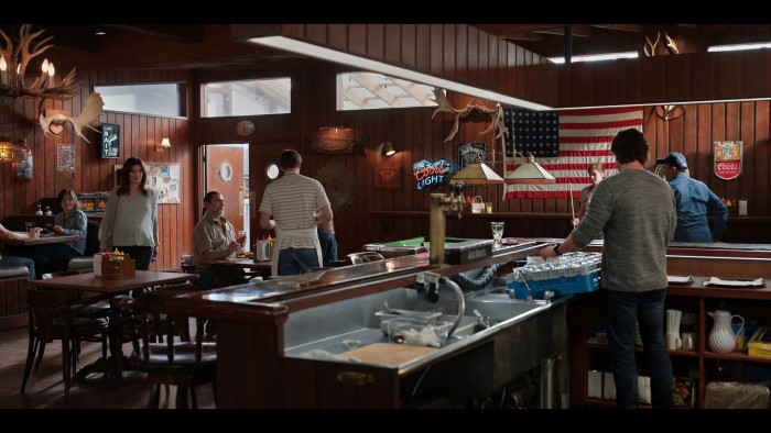Coors Light Beer Neon Sign and Jack Daniel's Tennessee Whiskey Poster and Coors Sign in Virgin River S04E09 Bombshells