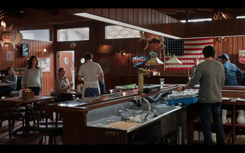 Coors Light Beer Neon Sign and Jack Daniel’s Tennessee Whiskey Poster and Coors Sign in Virgin River S04E09 Bombshells