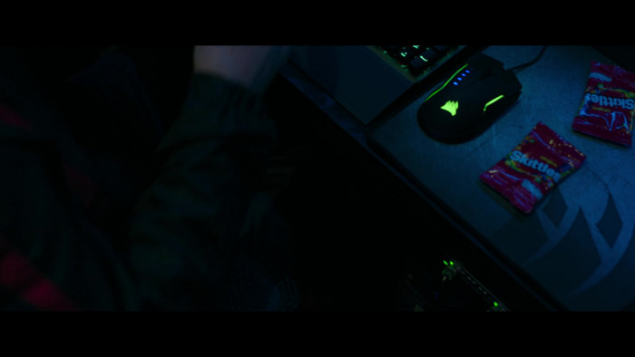 Corsair Gaming Mouse and Skittles Candies in The Gray Man (2022)