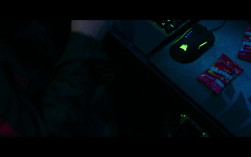 Corsair Gaming Mouse and Skittles Candies in The Gray Man (2022)