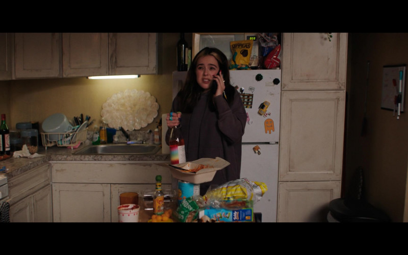 HIPPEAS Organic Chickpea Puffs and Cholula Hot Sauce of Zoey Deutch as Danni Sanders in Not Okay (2022)