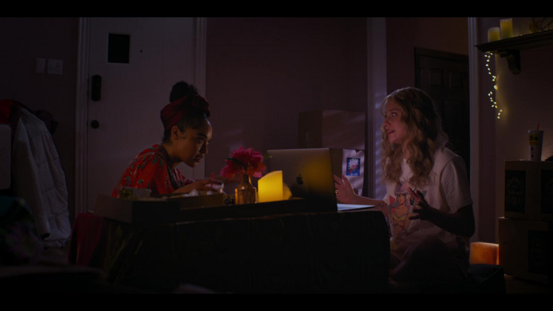 Apple MacBook Laptop of Lili Reinhart as Natalie and Tito's Tacos Drink Cup in Look Both Ways (2022)